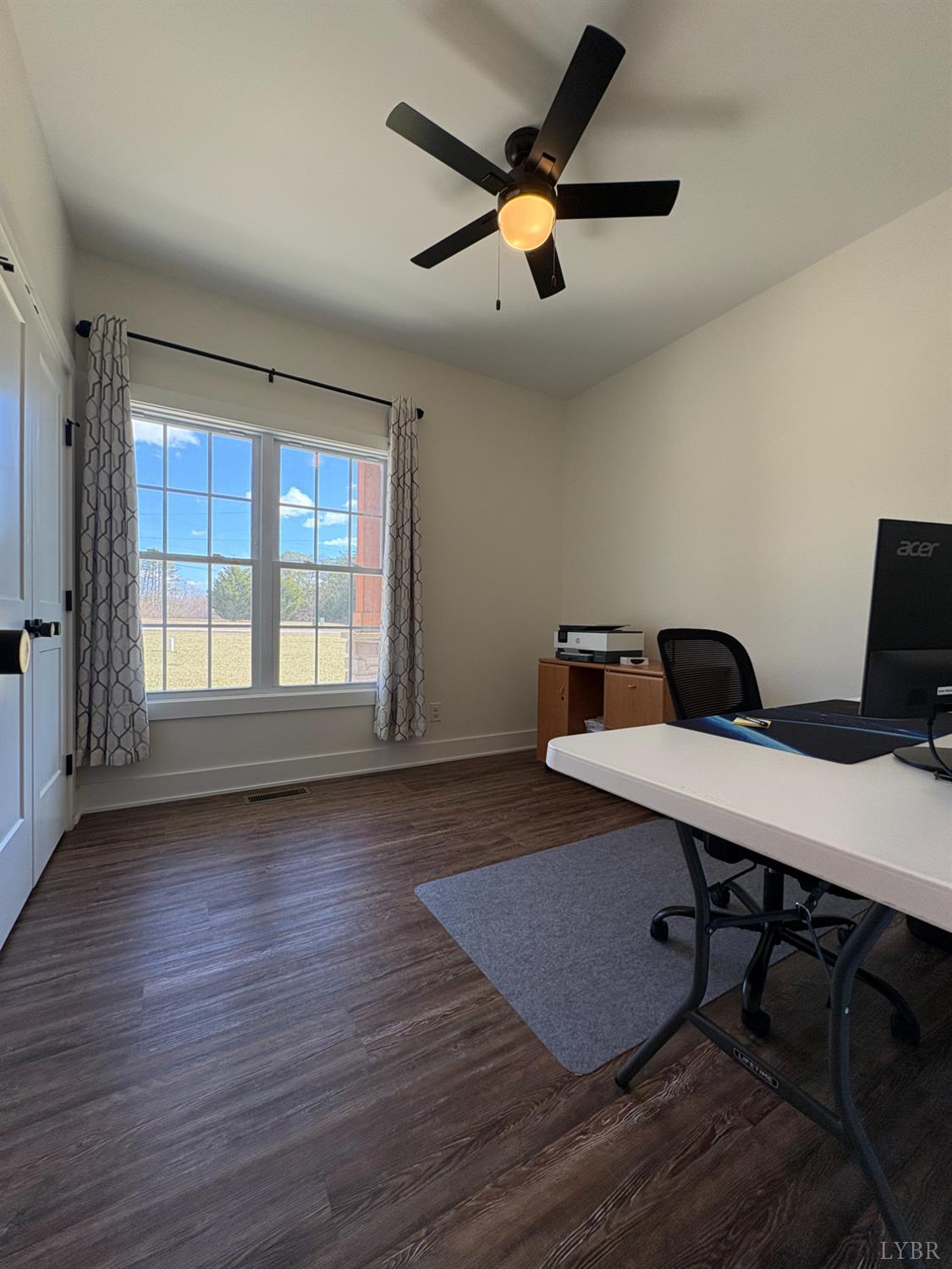 2142 Clarks Road Rustburg, VA 24588 - Photo 25 of 70 a workspace with wooden floor