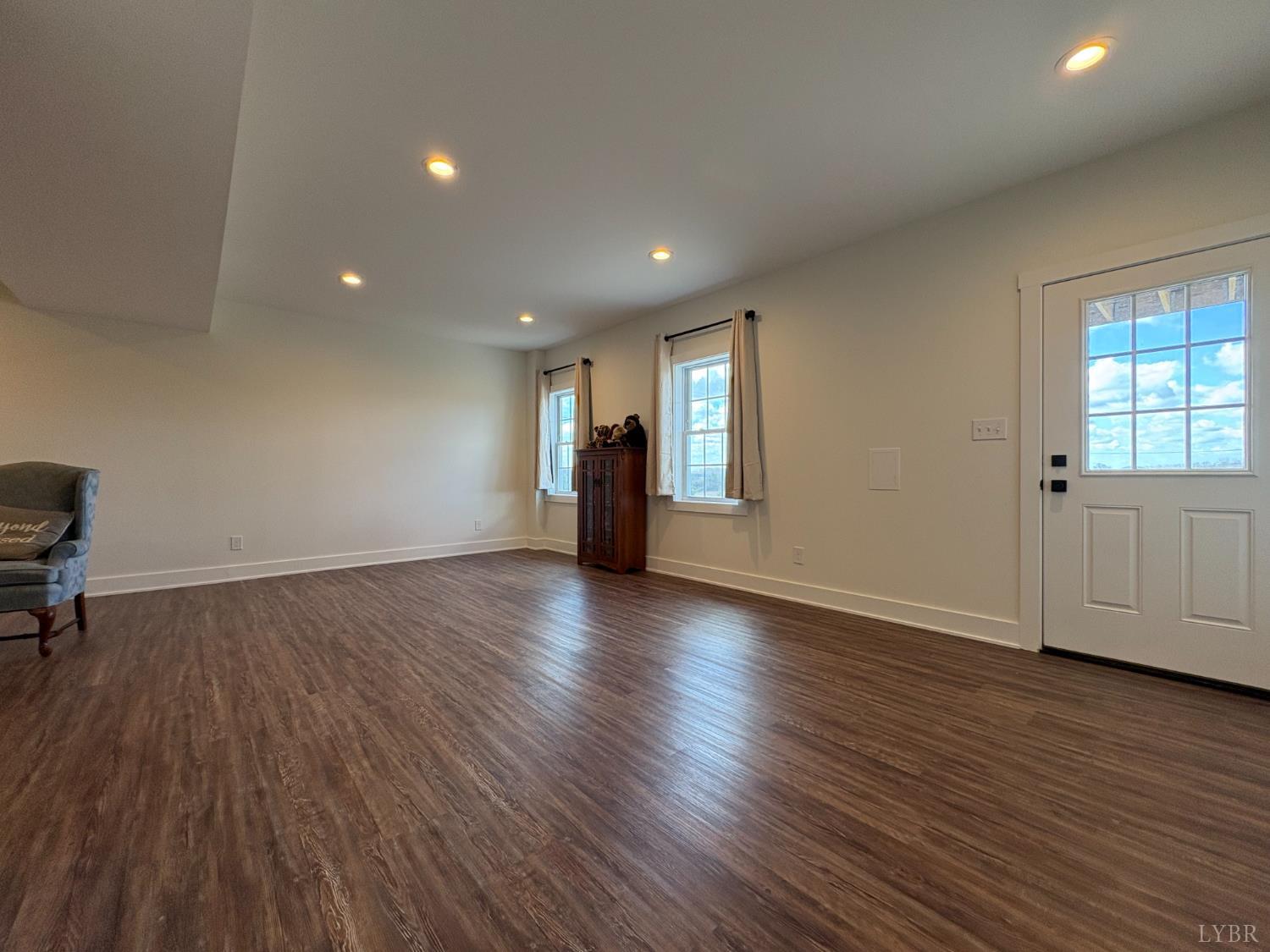 2142 Clarks Road Rustburg, VA 24588 - Photo 52 of 70 an empty room with wooden floor and windows