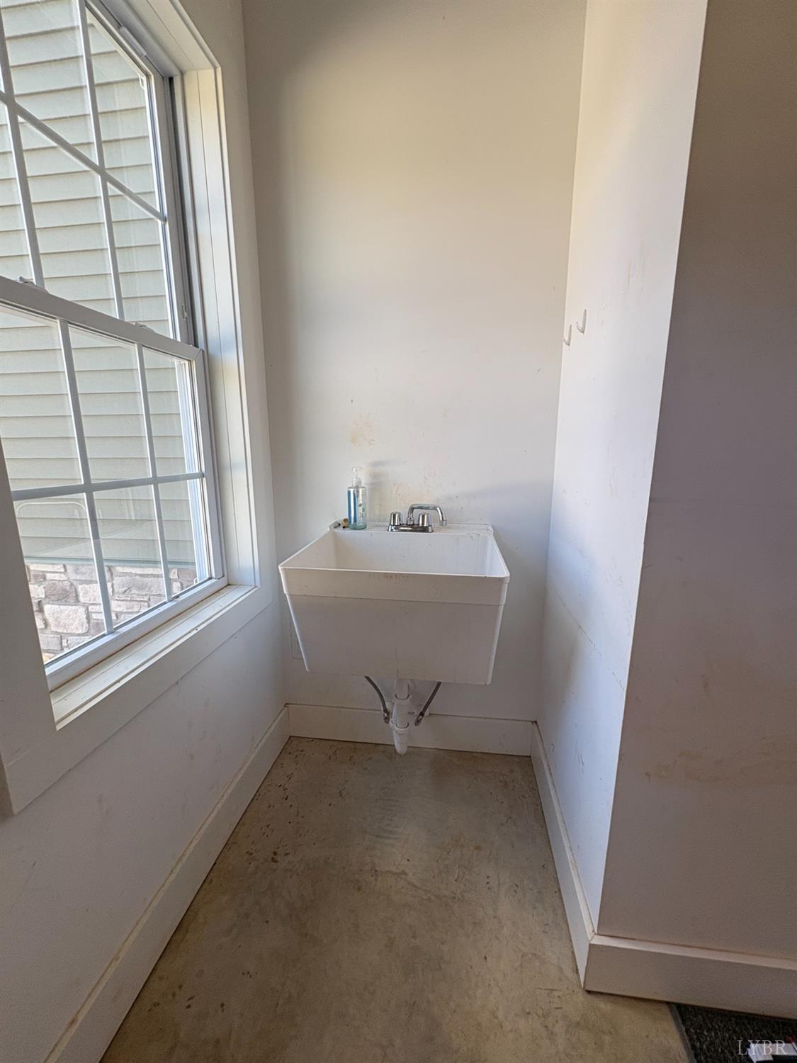 2142 Clarks Road Rustburg, VA 24588 - Photo 63 of 70 a bathroom with sink and window