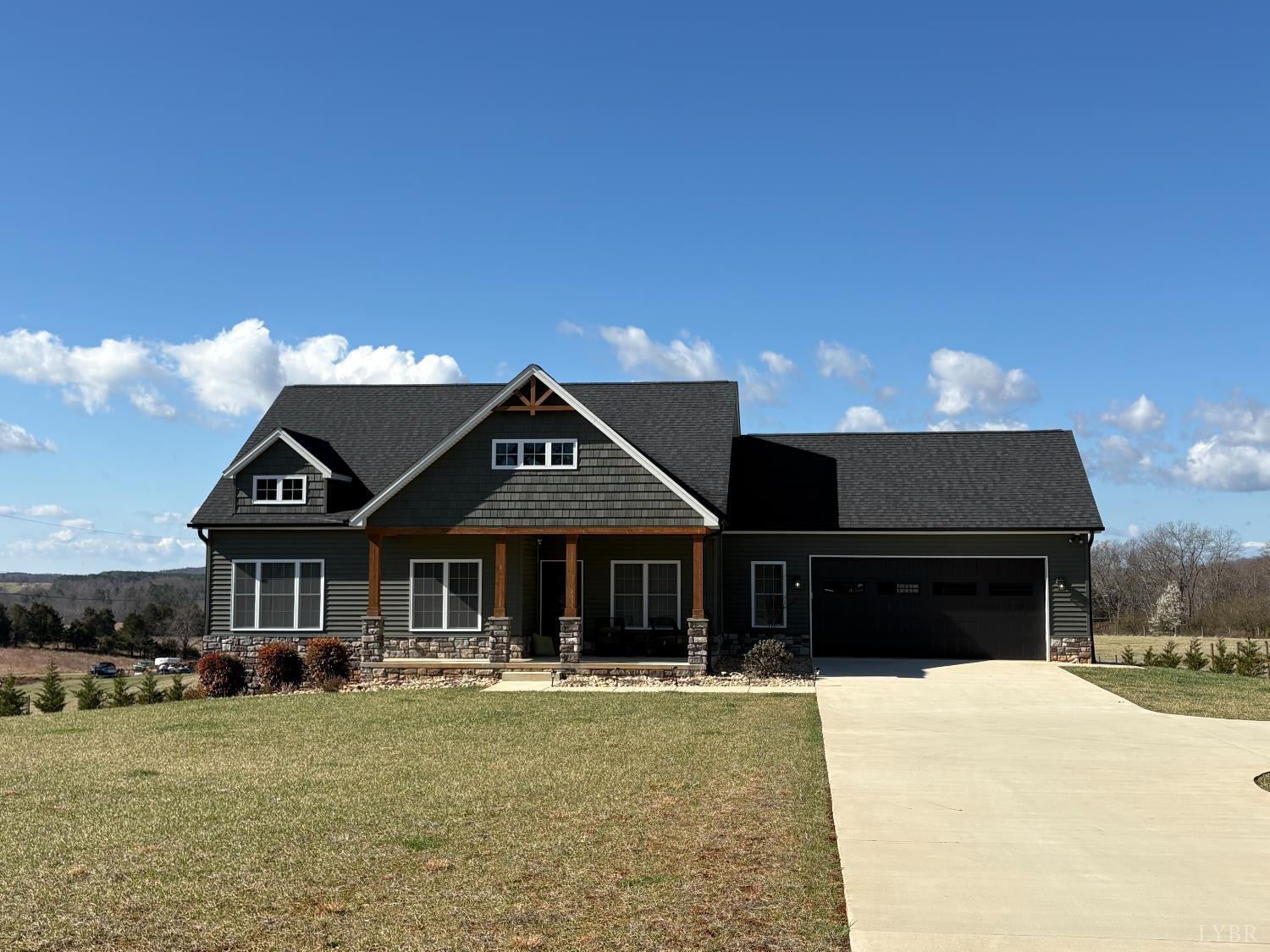 2142 Clarks Road Rustburg, VA 24588 - Photo 7 of 70 a front view of a house with a yard