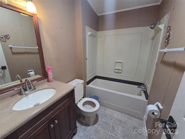 a bathroom with a sink a toilet and a bathtub