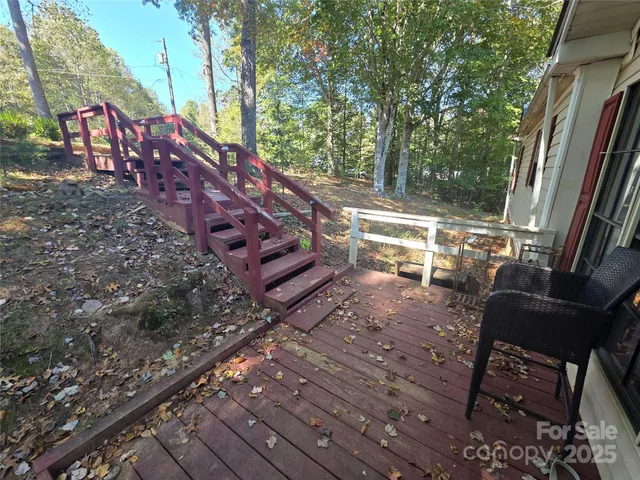a view of yard with wooden deck
