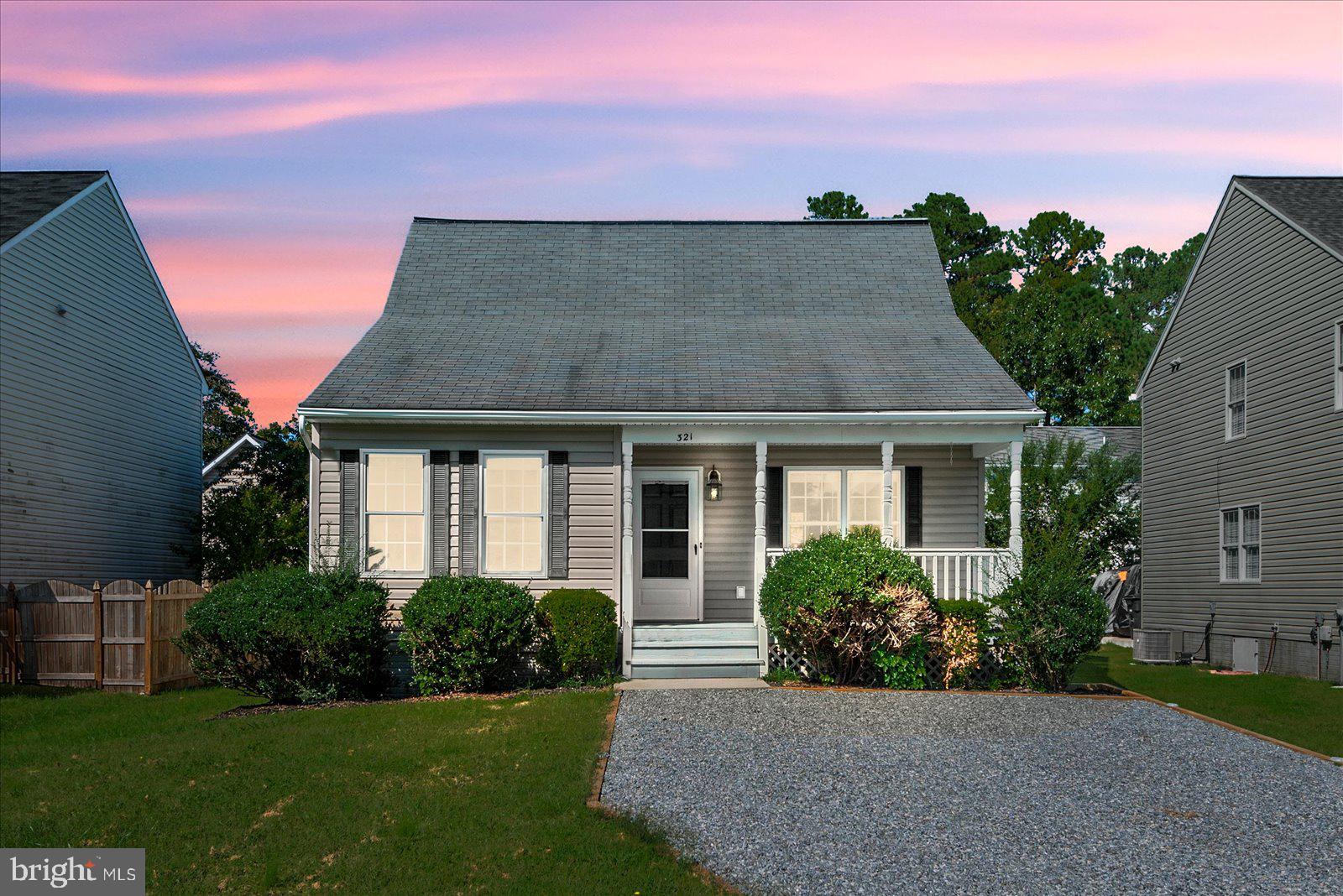 321 3rd Street Colonial Beach, VA 22443 - Photo 1 of 47 a front view of a house with a yard