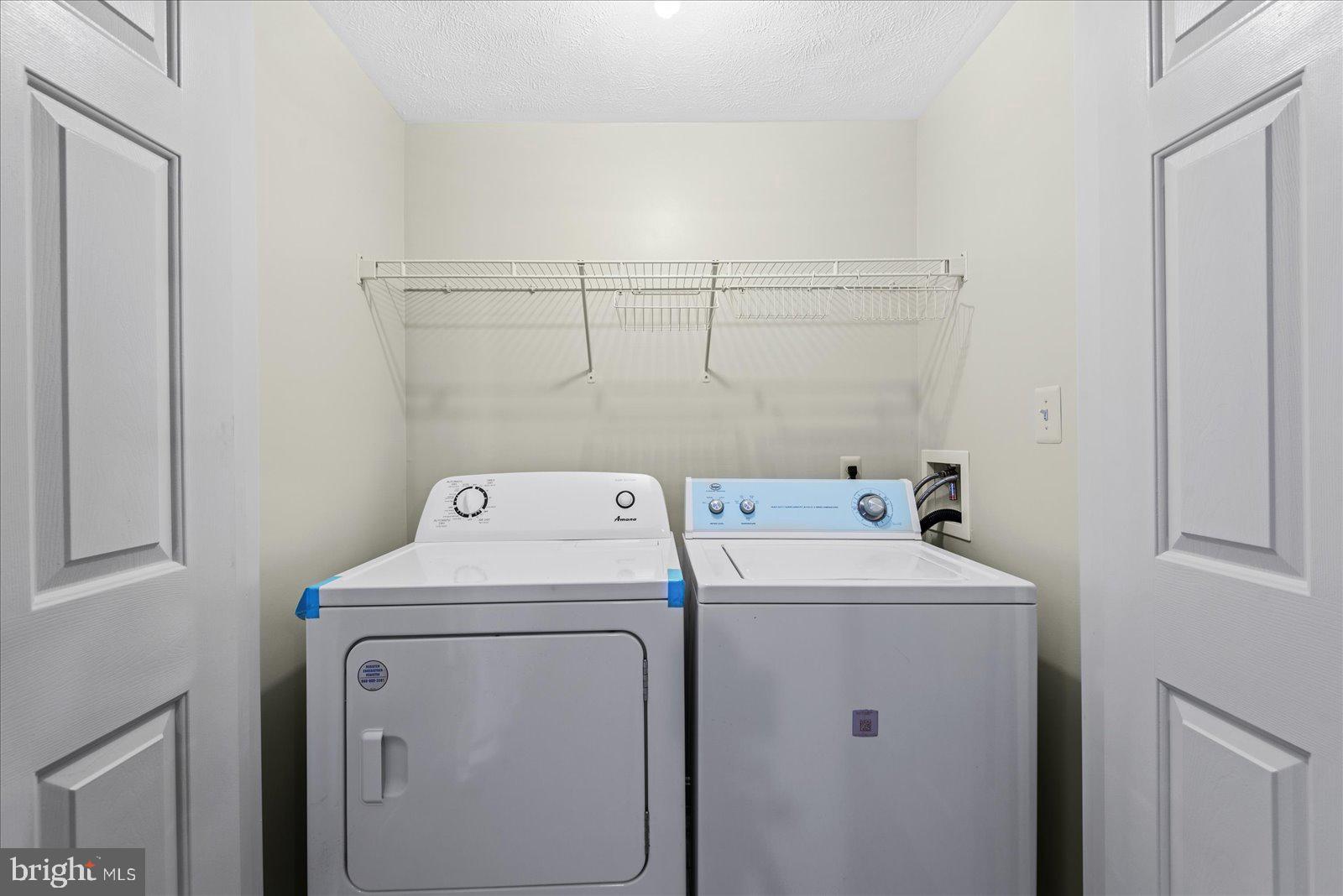 321 3rd Street Colonial Beach, VA 22443 - Photo 19 of 47 a utility room with dryer and washer
