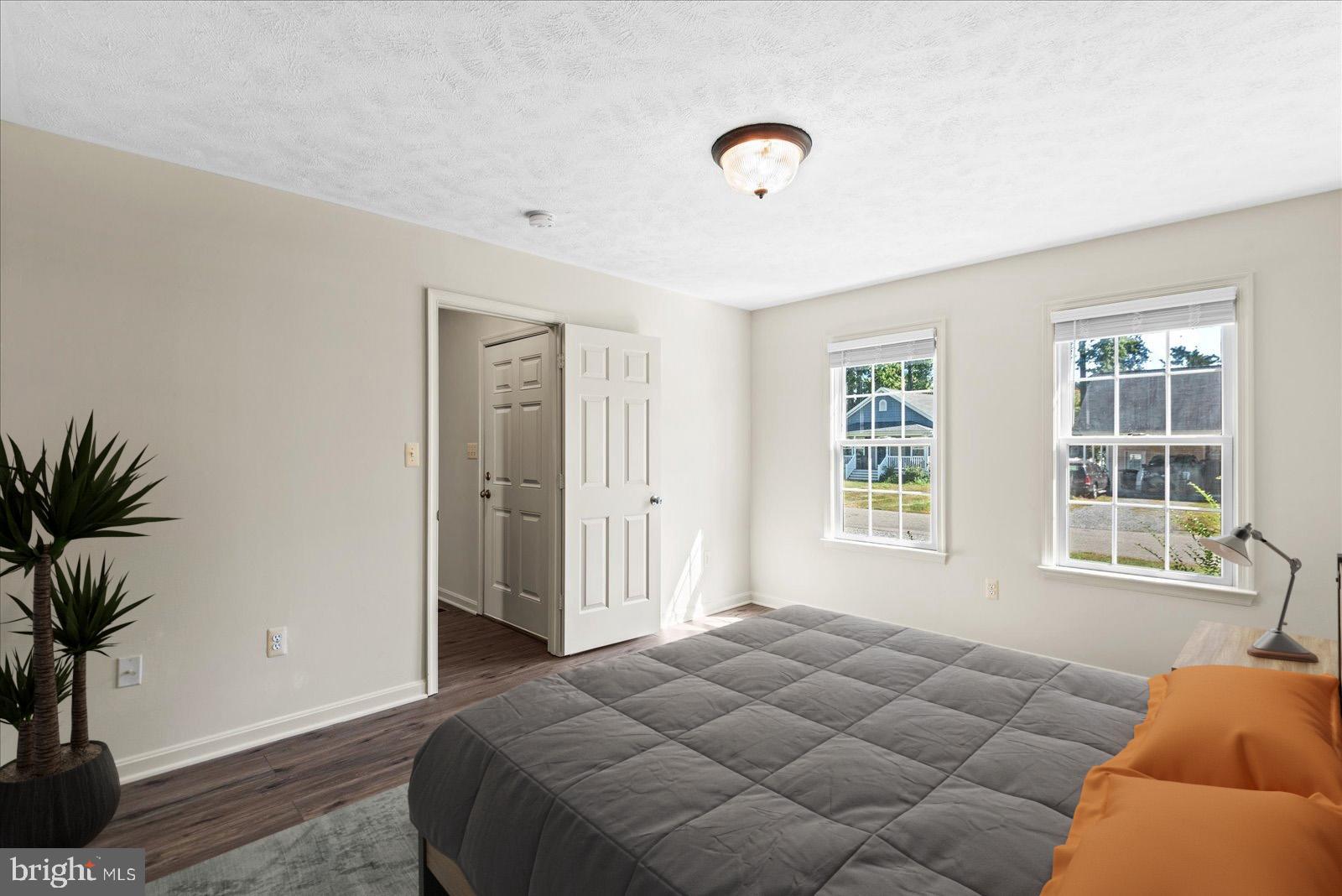 321 3rd Street Colonial Beach, VA 22443 - Photo 22 of 47 a bedroom with a bed and a window