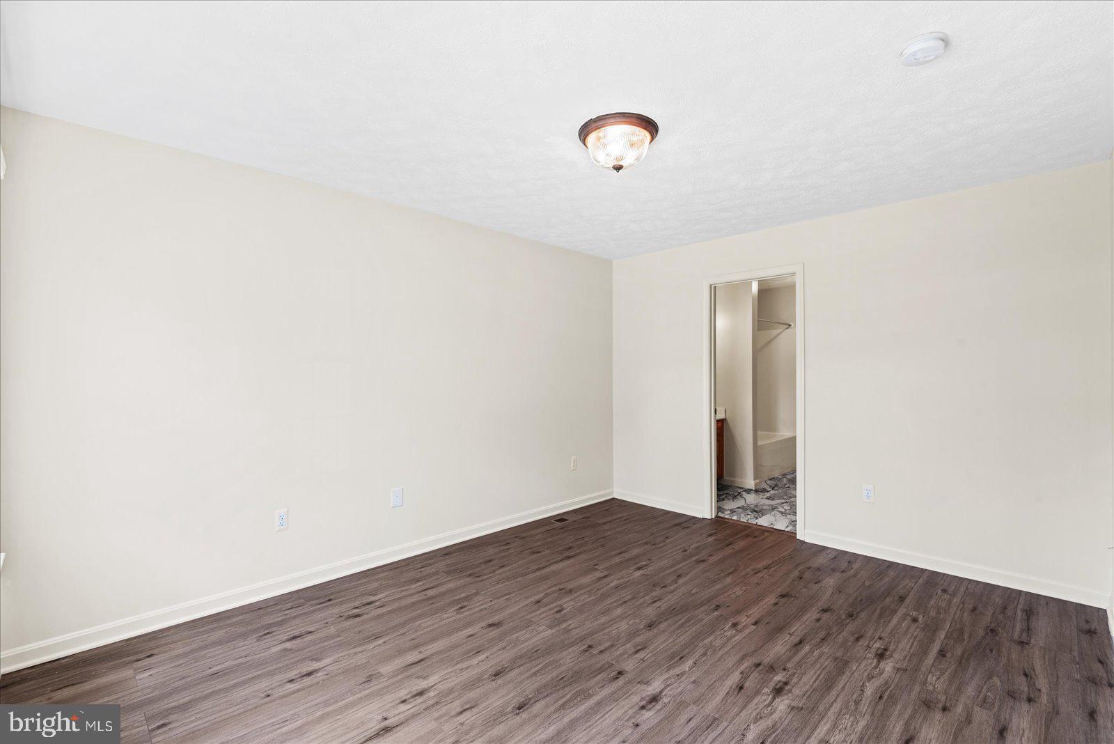 321 3rd Street Colonial Beach, VA 22443 - Photo 23 of 47 a view of a room with wooden floor