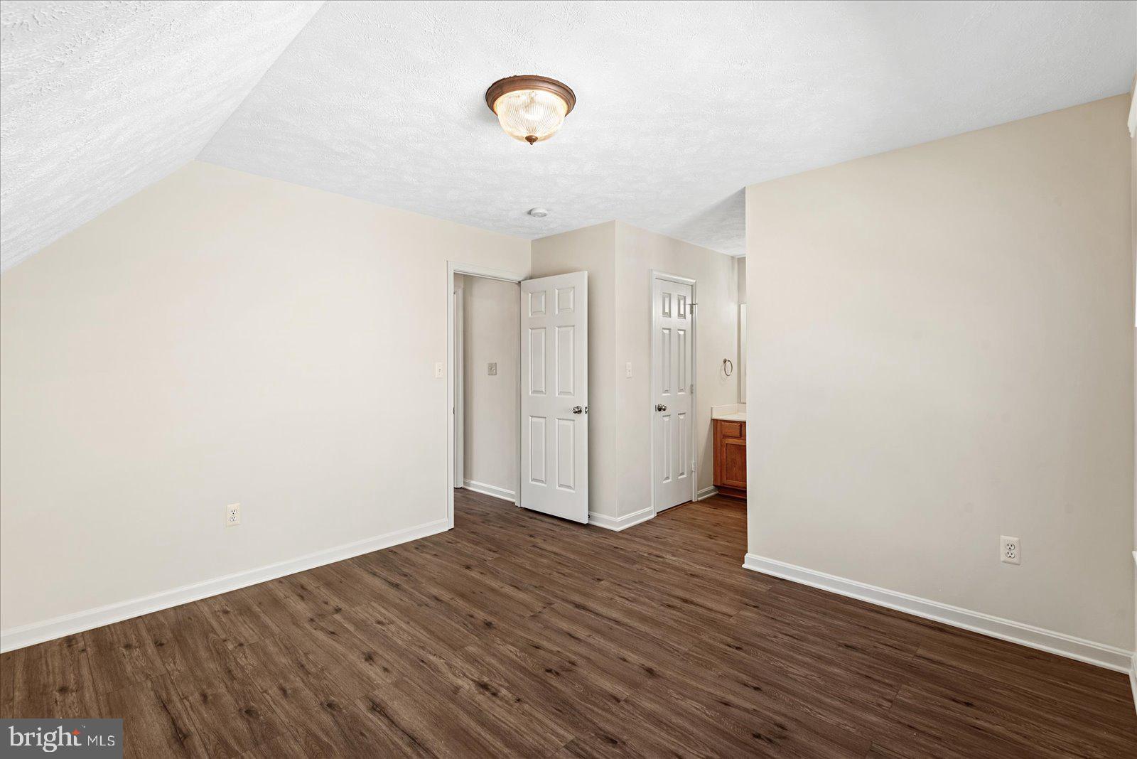 321 3rd Street Colonial Beach, VA 22443 - Photo 34 of 47 a view of a room with wooden floor