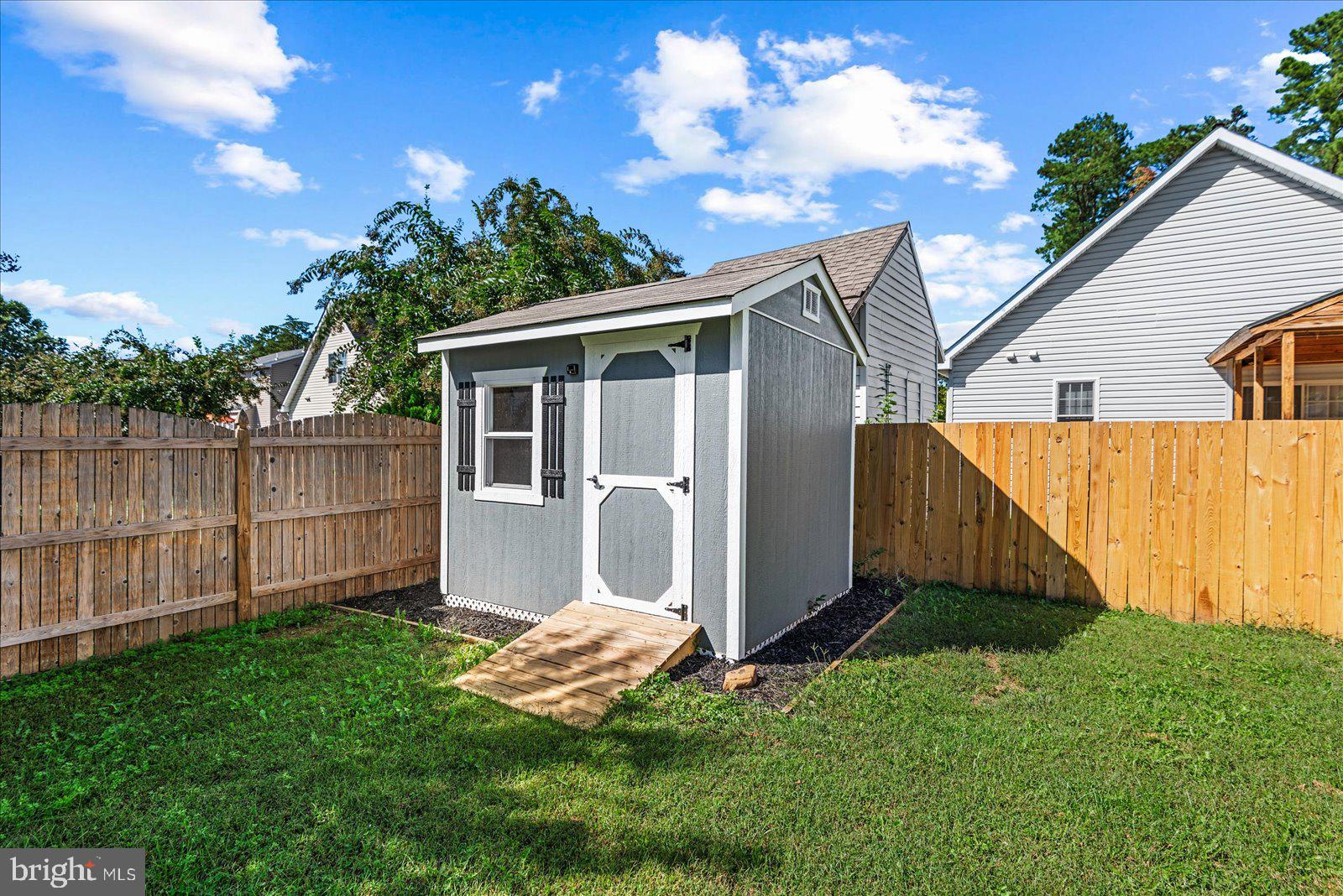 321 3rd Street Colonial Beach, VA 22443 - Photo 46 of 47 a view of a back yard of the house