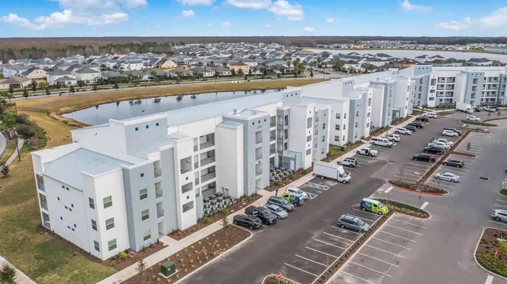 3191 Paradox Circle, Unit 202 Kissimmee, FL 34746 - Photo 1 of 1 an aerial view of a city