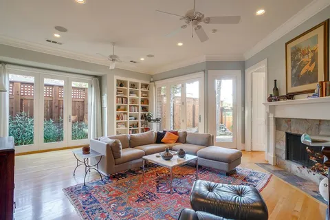 a bedroom with a bed and a couch