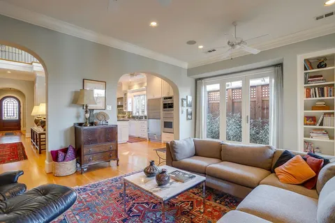 a view of an entryway with wooden shelves