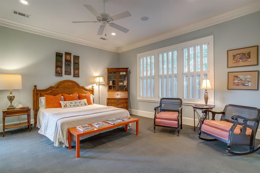 1620 Western Avenue Fort Worth, TX 76107 - Photo 24 of 40 a bedroom with a bed and a couch