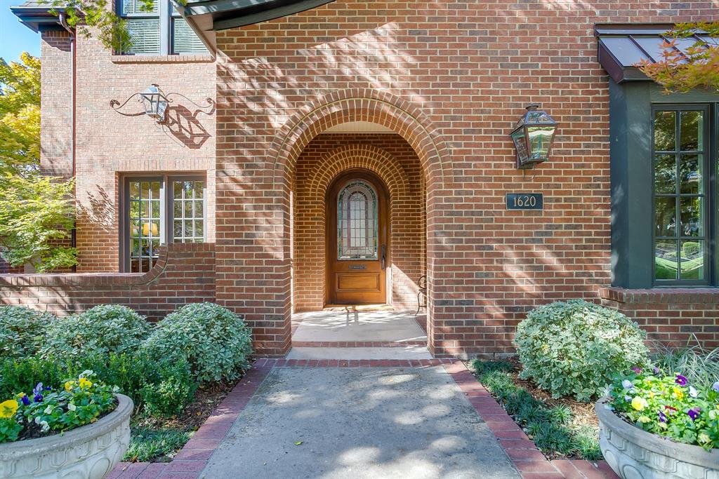 1620 Western Avenue Fort Worth, TX 76107 - Photo 4 of 40 a front view of a house with a garden