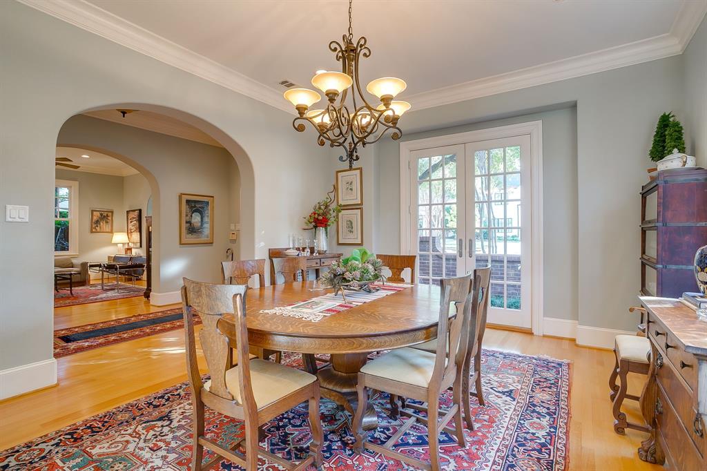 1620 Western Avenue Fort Worth, TX 76107 - Photo 9 of 40 a dining room with furniture a chandelier and wooden floor
