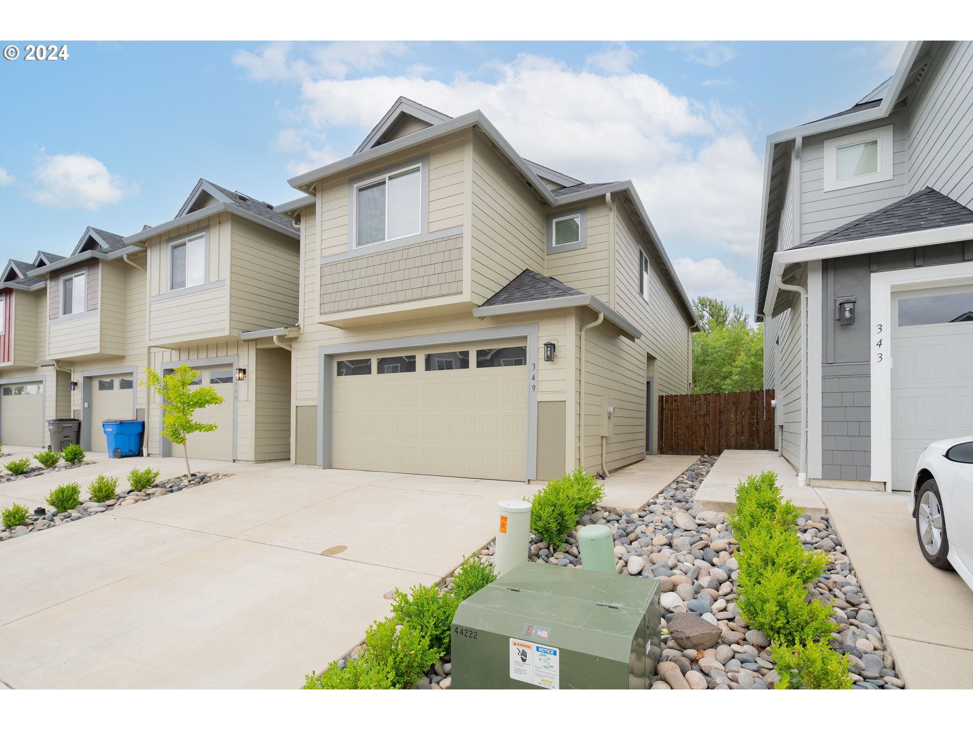 349 South 69th Place Ridgefield, WA 98642 - Photo 2 of 45 a front view of a house with garden