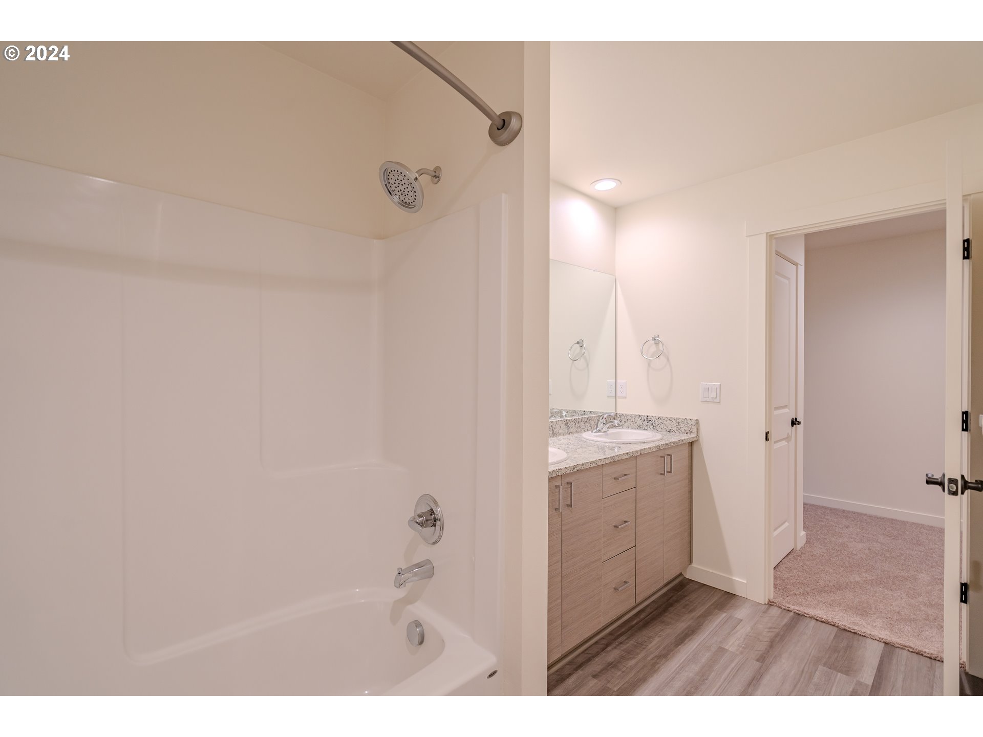 349 South 69th Place Ridgefield, WA 98642 - Photo 28 of 45 a bathroom with a sink and a mirror