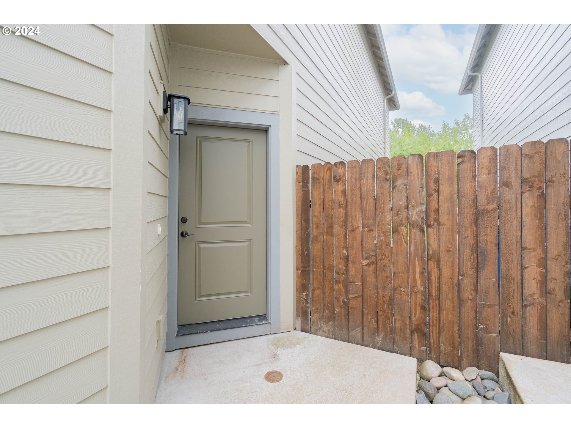 349 South 69th Place Ridgefield, WA 98642 - Photo 3 of 45 a view of a wooden door