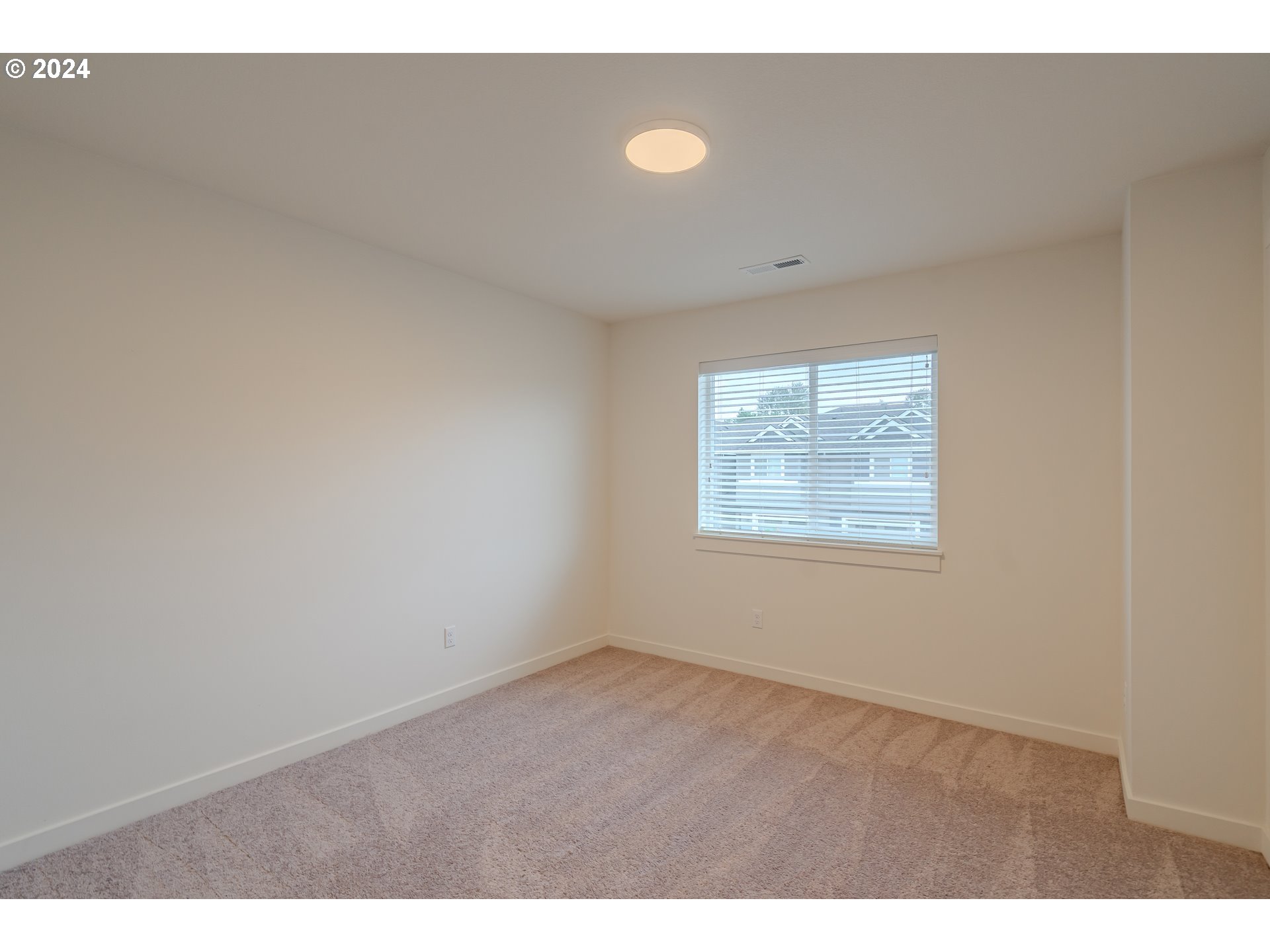 349 South 69th Place Ridgefield, WA 98642 - Photo 33 of 45 a view of an empty room with a window