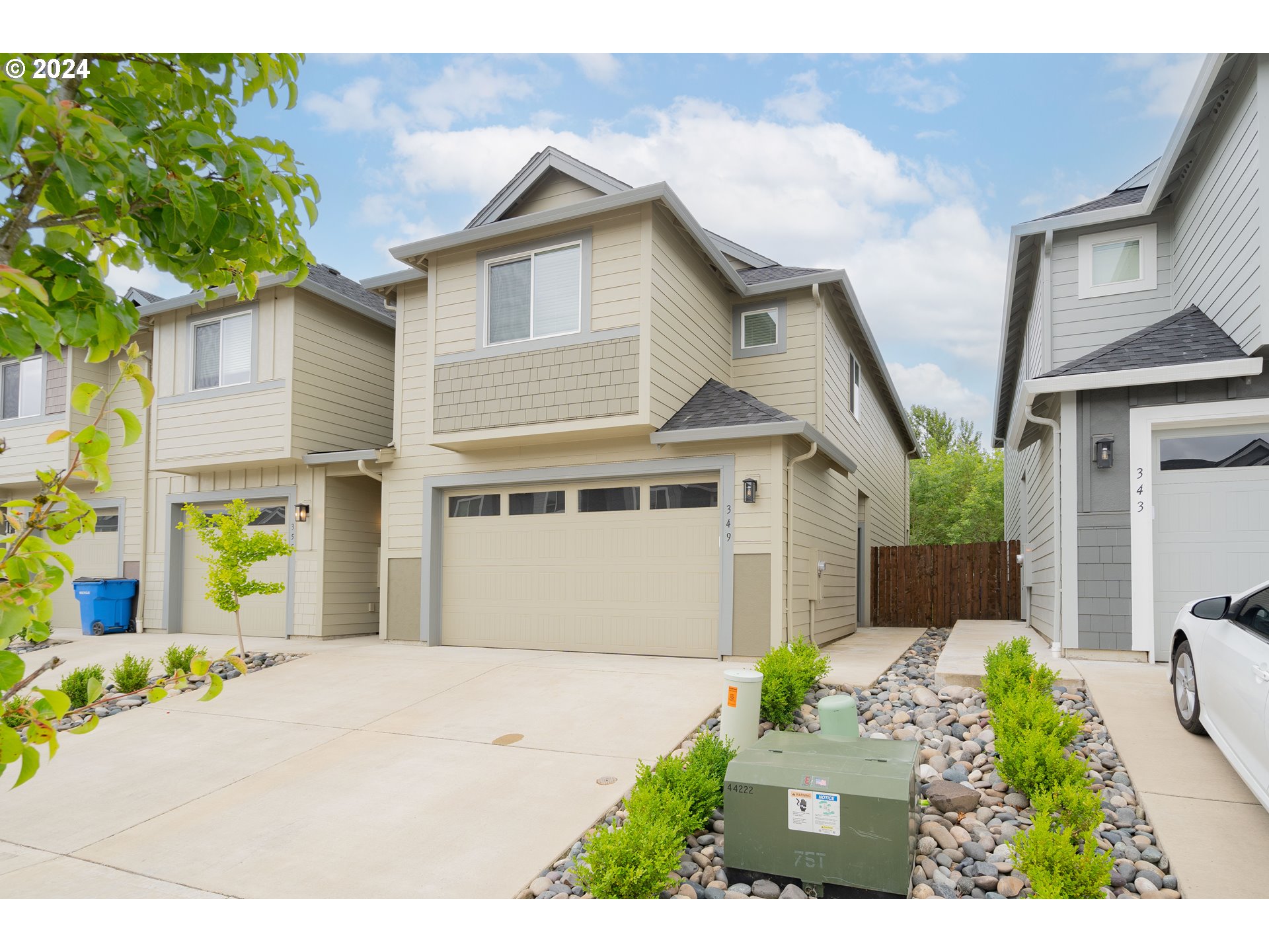 349 South 69th Place Ridgefield, WA 98642 - Photo 43 of 45 a front view of a house with a garden