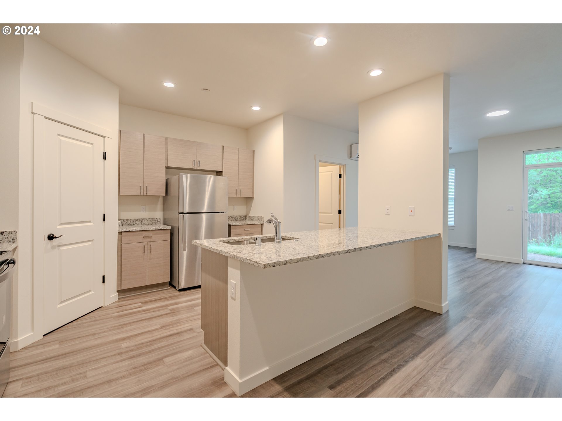 349 South 69th Place Ridgefield, WA 98642 - Photo 8 of 45 a view of kitchen with wooden floor