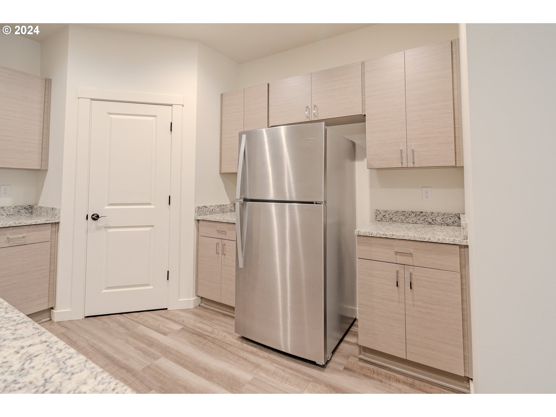 349 South 69th Place Ridgefield, WA 98642 - Photo 9 of 45 a kitchen with cabinets and stainless steel appliances