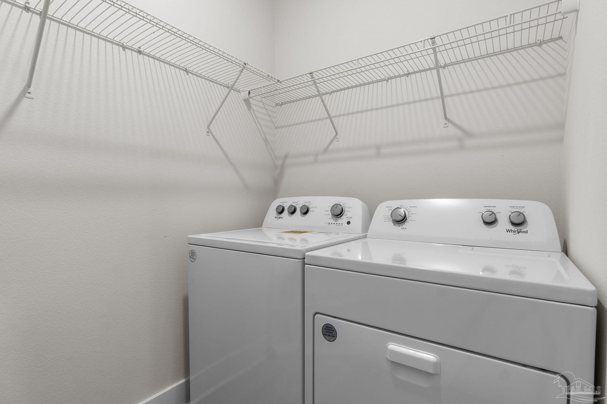 6060 Rutherford Loop Pensacola, FL 32526 - Photo 35 of 44 a utility room with dryer and washer