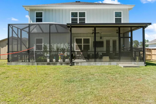 a view of a house with a swimming pool