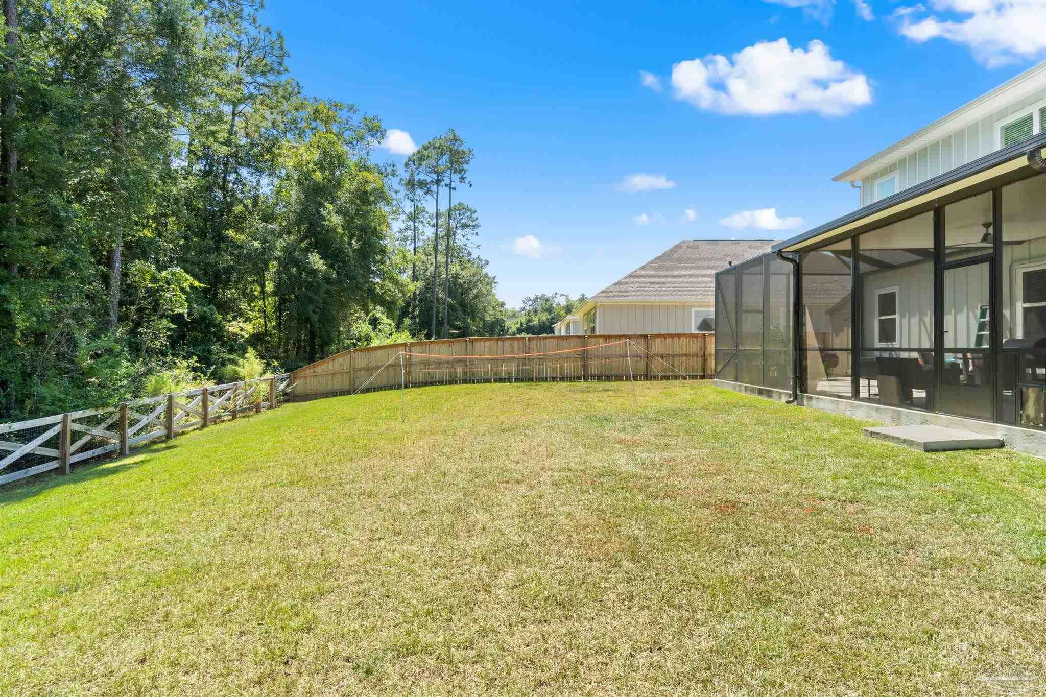 6060 Rutherford Loop Pensacola, FL 32526 - Photo 43 of 44 a swimming pool with yard