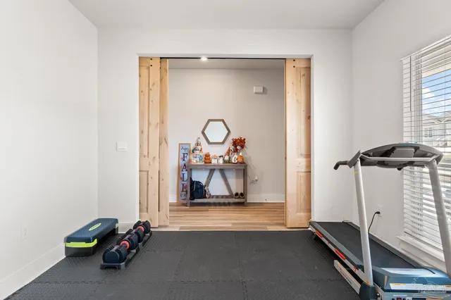 a view of a room with gym equipment