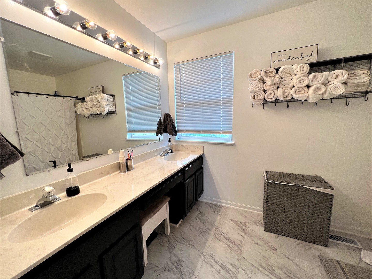 8563 Scheer Drive, Unit 8563 Tinley Park, IL 60487 - Photo 15 of 30 a bathroom with a double vanity sink mirror and