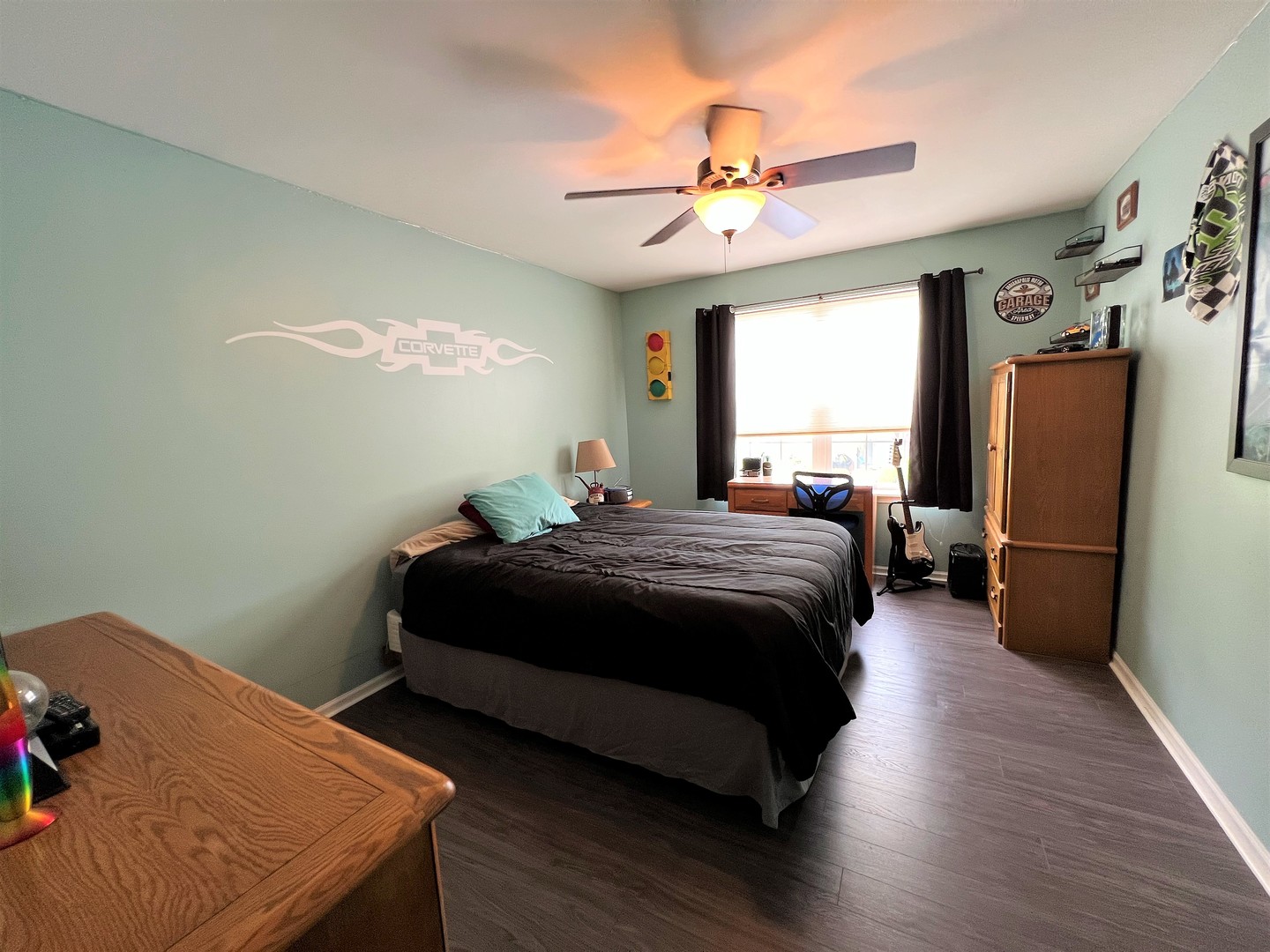 8563 Scheer Drive, Unit 8563 Tinley Park, IL 60487 - Photo 17 of 30 a bedroom with a bed dresser and a window