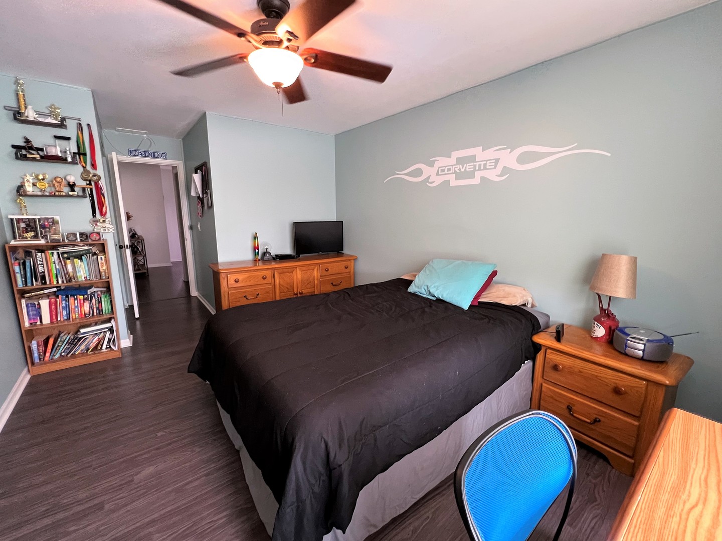 8563 Scheer Drive, Unit 8563 Tinley Park, IL 60487 - Photo 19 of 30 a bedroom with a bed window and a chandelier