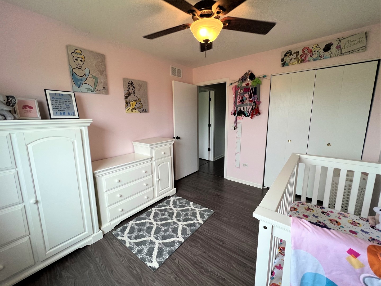 8563 Scheer Drive, Unit 8563 Tinley Park, IL 60487 - Photo 21 of 30 a view of a hallway with workspace and wooden floor