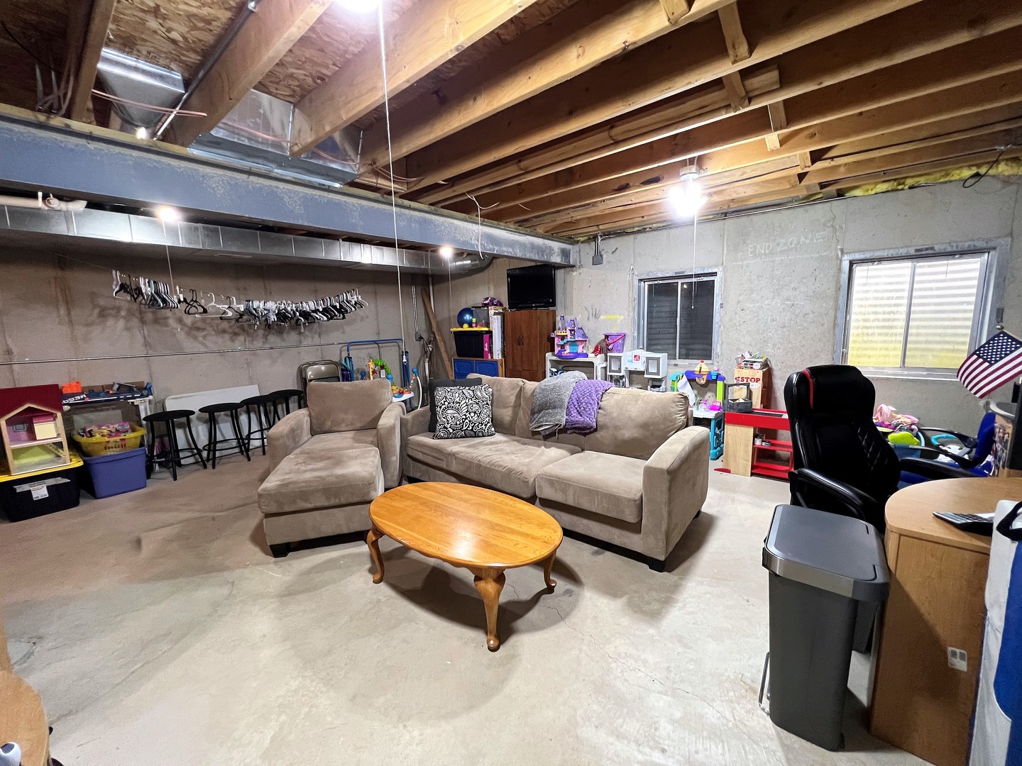 8563 Scheer Drive, Unit 8563 Tinley Park, IL 60487 - Photo 24 of 30 a living room with furniture and a table