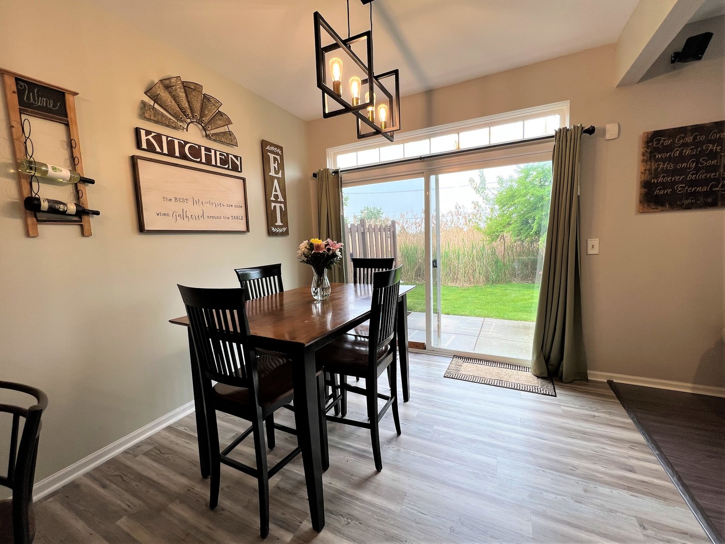 8563 Scheer Drive, Unit 8563 Tinley Park, IL 60487 - Photo 5 of 30 a view of a dining room with furniture window and wooden floor