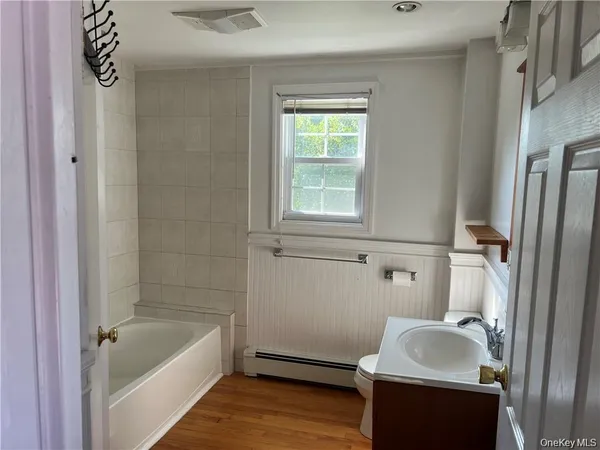 a bathroom with a sink and a bathtub