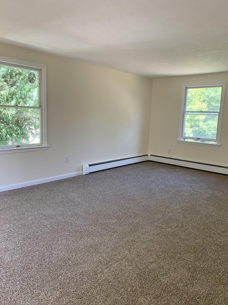 413 County Road Pocasset, MA 02559 - Photo 10 of 21 an empty room with windows