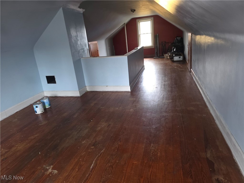 3125 Dover Road Wooster, OH 44691 - Photo 10 of 17 Bedroom featuring dark wood-type flooring and vaulted ceiling