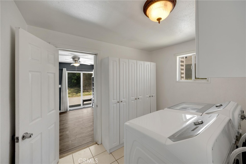 1003 West Stevenson Street Colton, CA 92324 - Photo 12 of 27 a bathroom with a sink and a mirror