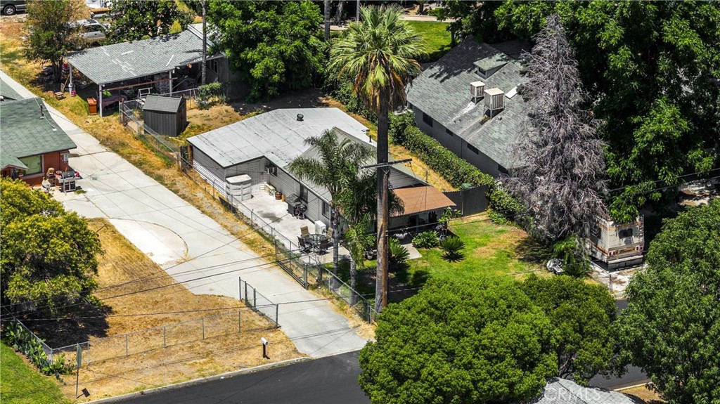 1003 West Stevenson Street Colton, CA 92324 - Photo 22 of 27 an aerial view of residential houses with outdoor space