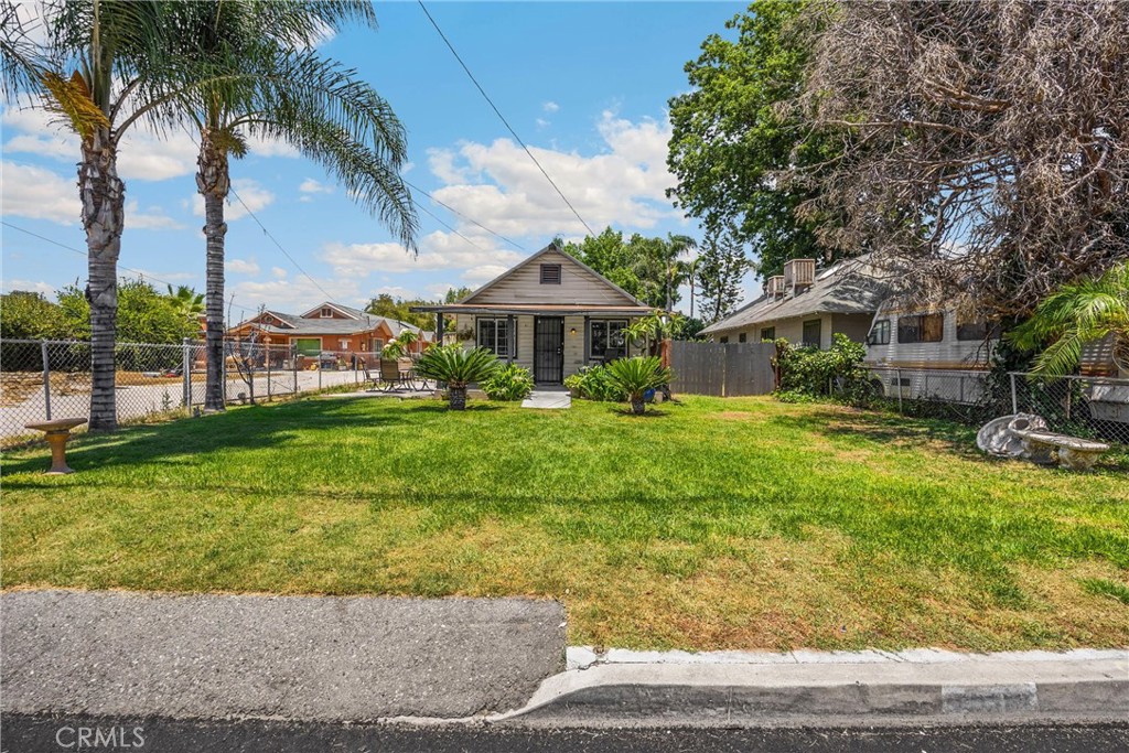 1003 West Stevenson Street Colton, CA 92324 - Photo 24 of 27 a front view of a house with garden