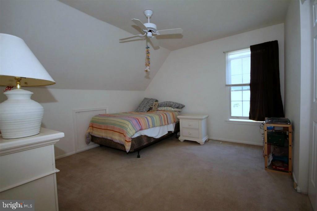228 Schooner Road Manahawkin, NJ 08050 - Photo 12 of 19 a bedroom with bed and a window