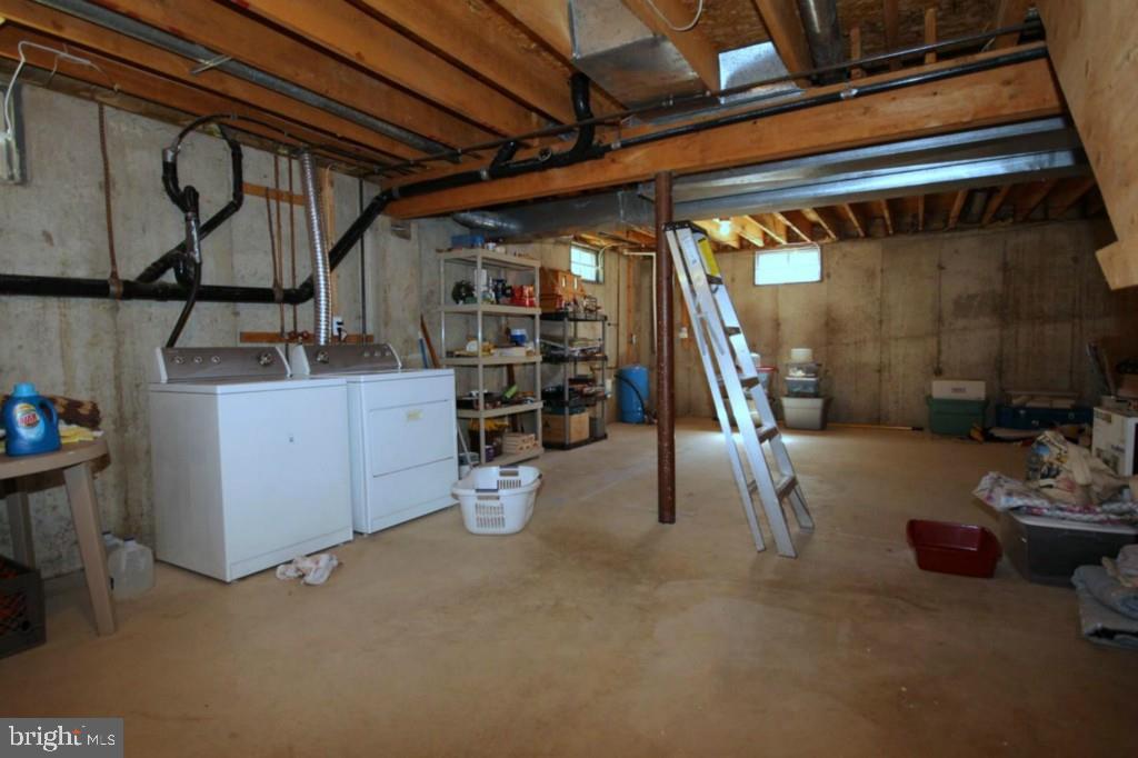 228 Schooner Road Manahawkin, NJ 08050 - Photo 17 of 19 a view of a room with gym equipment