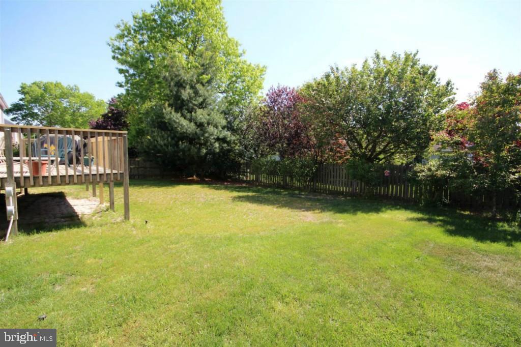 228 Schooner Road Manahawkin, NJ 08050 - Photo 19 of 19 a view of a swimming pool with a patio