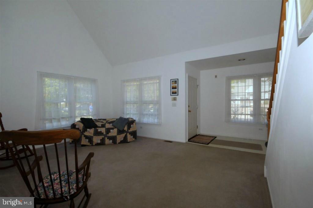 228 Schooner Road Manahawkin, NJ 08050 - Photo 5 of 19 a livingroom with furniture window and a ceiling fan