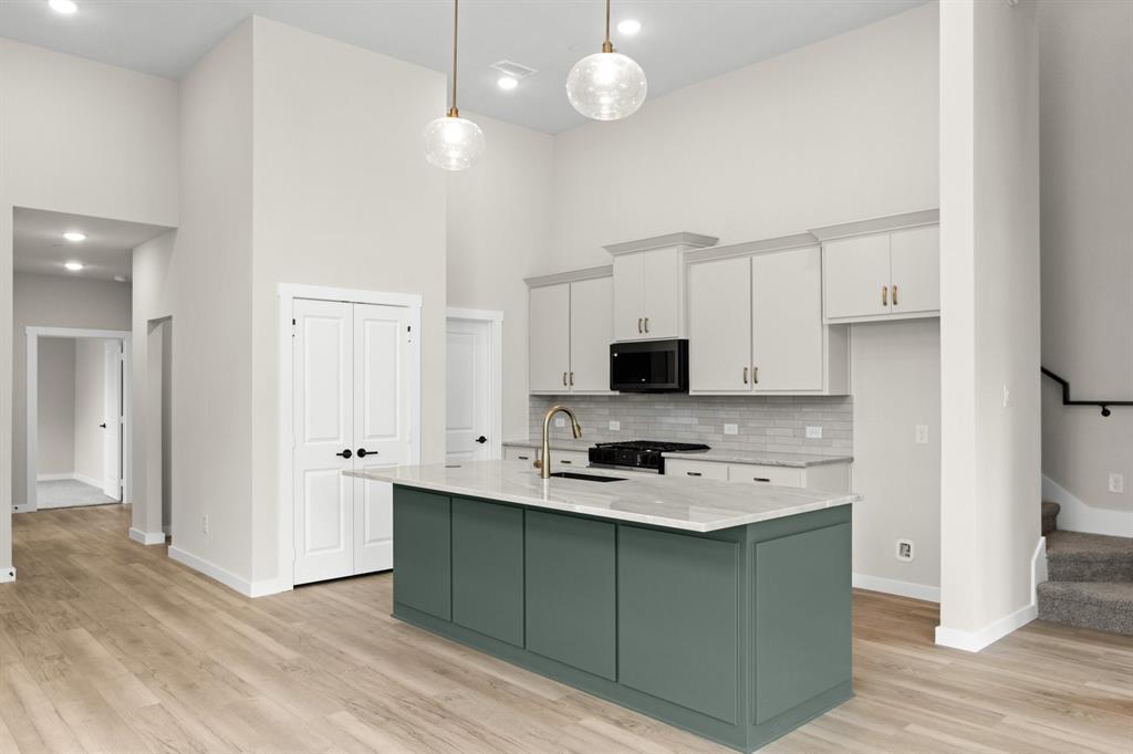 8609 Del Rio Trail Rowlett, TX 75089 - Photo 12 of 40 014-8609DelRioTrail-Wylie-TX-75098-Kitchen.jpg-SMALL
