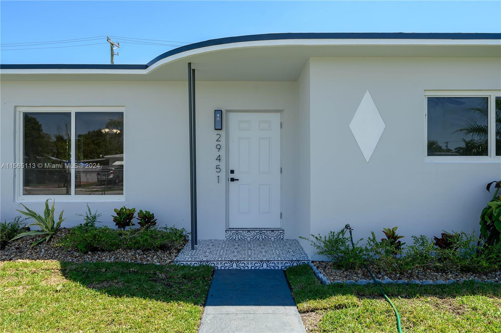 29451 Maine Road Homestead, FL 33033 - Photo 2 of 22 a front view of a house