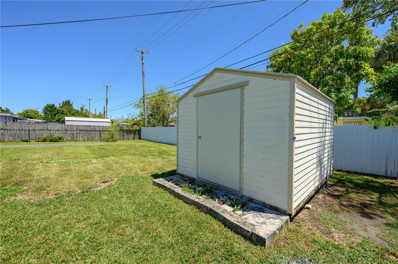 29451 Maine Road Homestead, FL 33033 - Photo 22 of 22 a view of a backyard with a garden