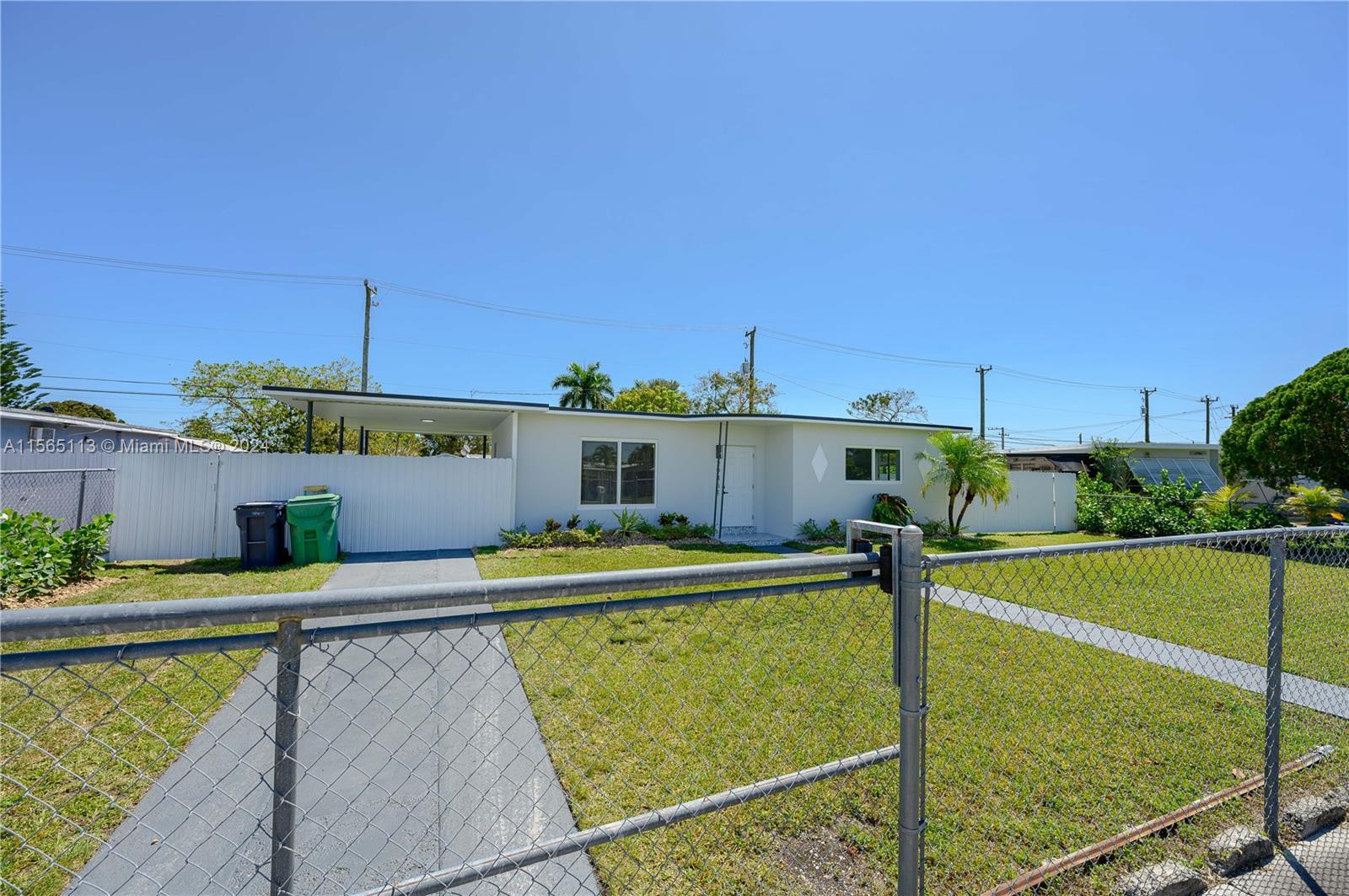 29451 Maine Road Homestead, FL 33033 - Photo 4 of 22 a view of a swimming pool with a patio