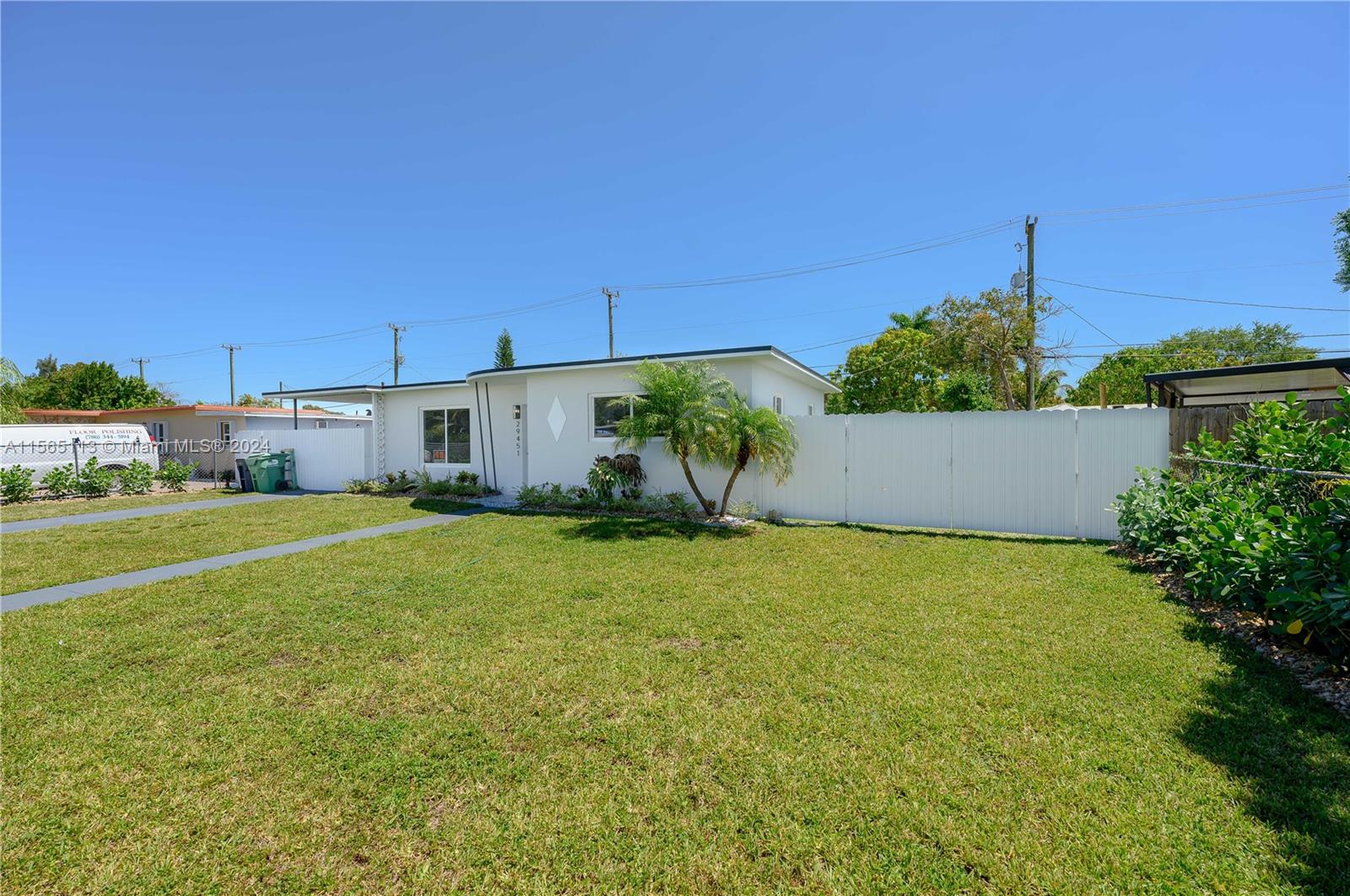 29451 Maine Road Homestead, FL 33033 - Photo 5 of 22 a house view with a garden space